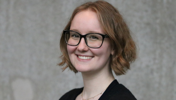 Headshot of a woman with glasses